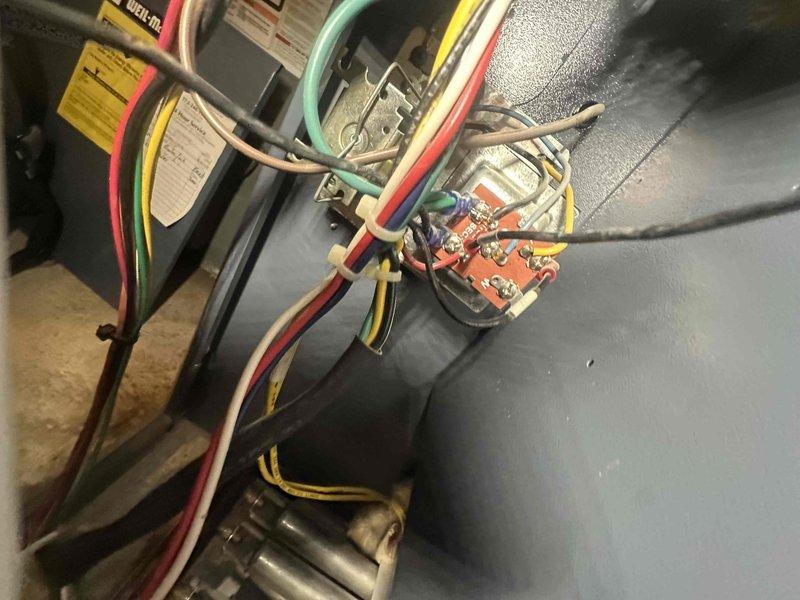 Responded to callback for heating system not shutting off. Inspected thermostat wiring connections and control board terminal connections. Identified and corrected improper wire terminations at the smart thermostat that were causing continuous heat call.