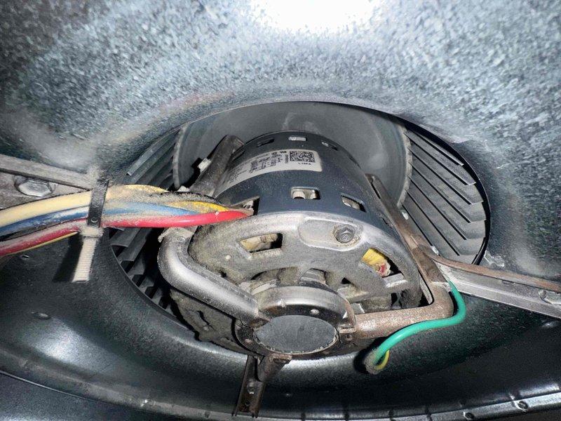 Performed routine maintenance on residential HVAC system under agreement COTW. Inspected furnace unit and connected humidifier, documenting condition of blower motor assembly, electrical connections, and ductwork configuration. All components functioning properly with seasonal damper settings verified.