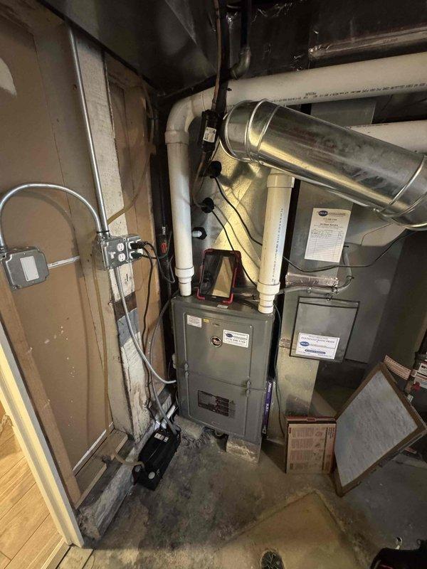 Performed scheduled maintenance on residential furnace and humidifier per agreement. Replaced 16x25x1 filter with new general specification filter. Inspected blower wheel assembly and ductwork, documenting current condition with photos. Completed COTW (Cleaned On The Way) service ensuring optimal system operation.