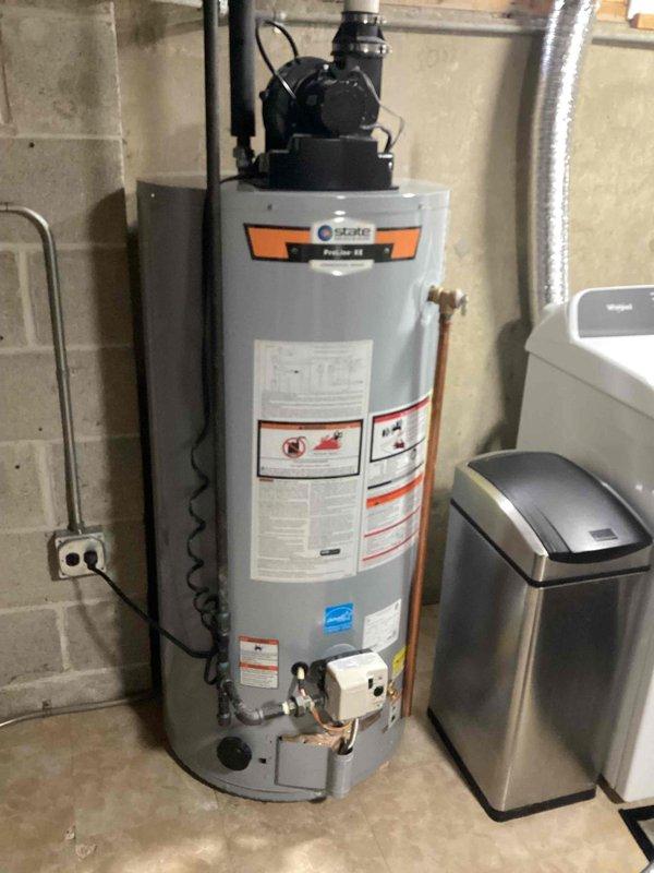 Performed diagnostic service on State ProLine SE water heater system not functioning properly. Inspected unit components including pump assembly, PVC venting configuration, and electrical connections. Completed check-out-the-window (COTW) service to restore proper operation.