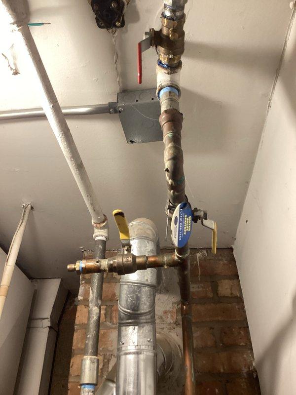 Performed complete check and clean on furnace and water heater per maintenance agreement. Inspected gas combustion chamber showing proper blue flame pattern and clean ignition. Examined plumbing connections and valves on water supply system, noting normal mineral buildup but no leaks or immediate concerns. Media replacement not included in this service.