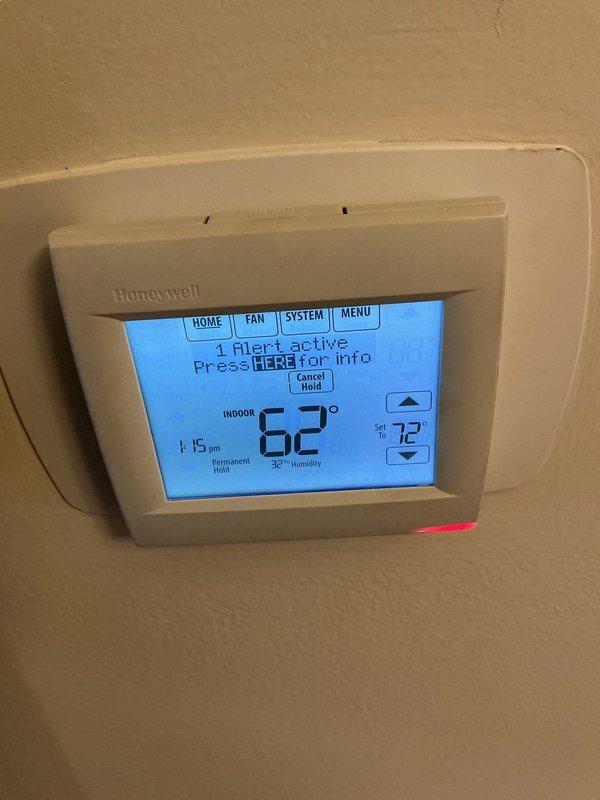 Responded to no heat call for 10+ year old Comfortmaker furnace. Diagnostic found system with blower operating but no heat production and thermostat displaying alert. Determined cause was failed flame sensor, cleaned and reinstalled component which restored proper ignition sequence and heating function.
