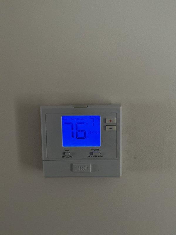 Completed standard maintenance service on a GS furnace with 16x25x1 filter. Inspected thermostat functionality (Pro brand digital display) and examined main furnace unit with connected ductwork. System appears to be operating within normal parameters with no immediate concerns identified.