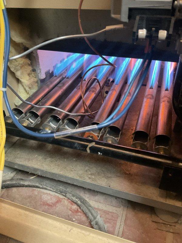 Returned to residence to replace faulty gas valve in boiler system as scheduled. Disconnected existing gas line, removed deteriorated valve assembly from heat exchanger, and installed new OEM gas valve. Performed operational test after installation, confirming proper ignition sequence and normal flame pattern across copper heat exchanger tubes.