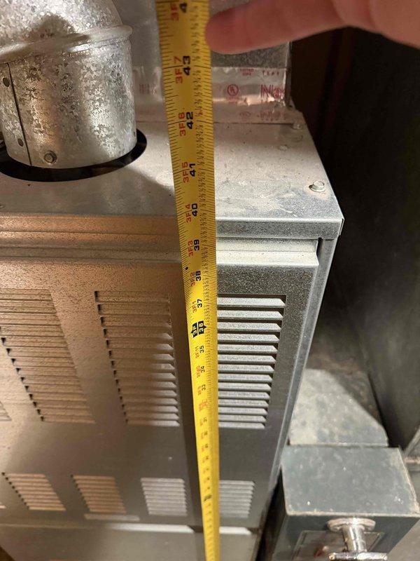 Conducted comprehensive assessment for Carrier Comfort 14 SEER AC installation, taking detailed measurements of existing HVAC equipment (approximately 25" height) and ventilation components (18-19"). Documented current system configuration including ductwork insulation (Nashua 324A) to ensure proper sizing and compatibility for the new installation.