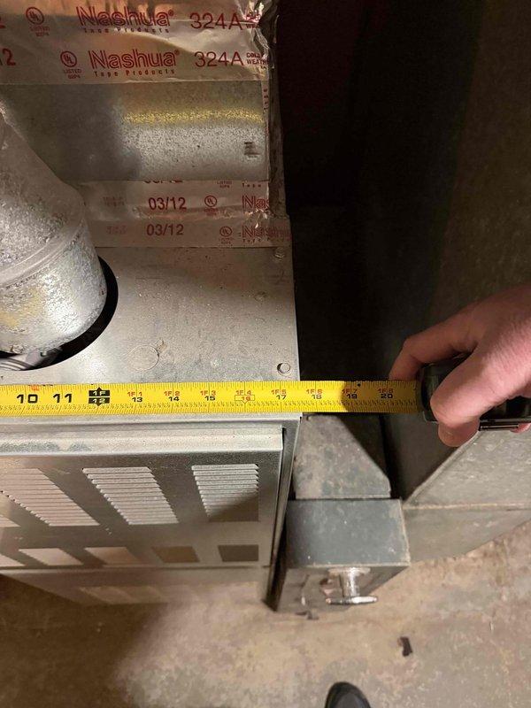 Conducted comprehensive assessment for Carrier Comfort 14 SEER AC installation, taking detailed measurements of existing HVAC equipment (approximately 25" height) and ventilation components (18-19"). Documented current system configuration including ductwork insulation (Nashua 324A) to ensure proper sizing and compatibility for the new installation.