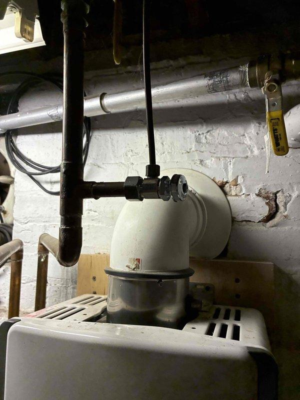 Successfully completed installation of a new furnace and humidifier system in the basement utility area. Installed proper ventilation connections including PVC and metal piping with appropriate valves and fittings. Ensured all electrical components were properly wired and the system was fully operational before completing the service.