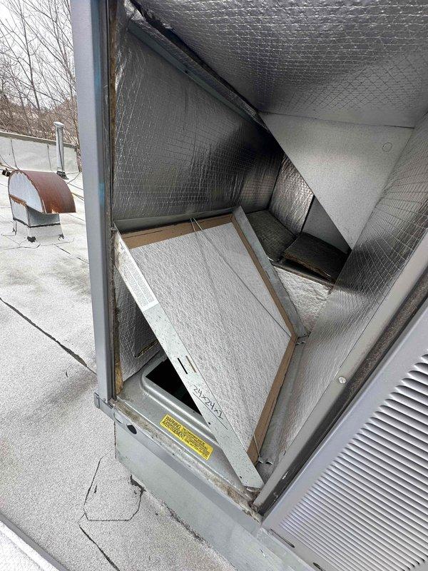 Performed scheduled commercial maintenance service on 2 rooftop units. Changed filters (16x25x2 and 24x24x1) and inspected interior components. Noted significant rust and corrosion on metal surfaces of one unit, particularly on the frame. Inspected mounting hardware and brackets while wearing protective gear. Completed all work as outlined in maintenance agreement.