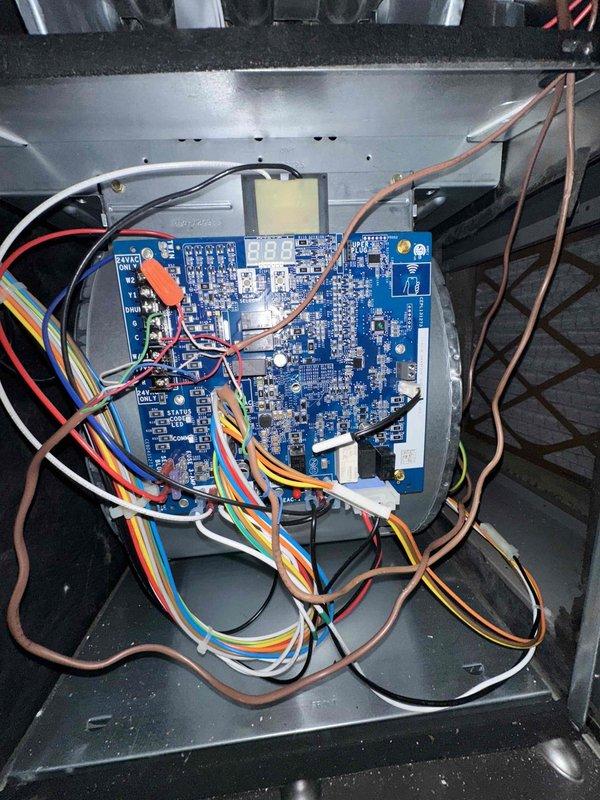 Performed HVAC system maintenance and enrolled customer in maintenance agreement program. Conducted diagnostic temperature reading (108.1°F) at supply vent using PDT650 thermometer and inspected control board circuitry, confirming proper electrical connections and component functionality.