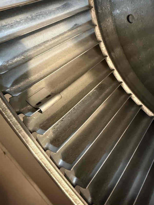 Responded to no heat call for 10+ year old second floor HVAC unit located in attic. Upon inspection, found significant dust accumulation on evaporator coil fins causing restricted airflow. Performed thorough cleaning of heat exchanger components to restore proper system operation and heat output.