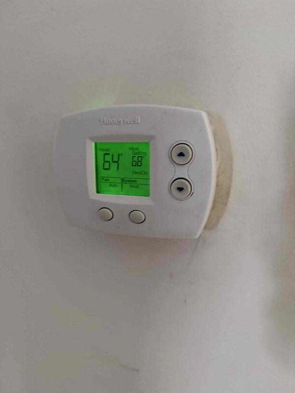 Responded to a no heat call for a 15-year-old furnace with blinking red light. Diagnosed fault code on control board, verified thermostat was calling for heat at 68°F (current temperature 64°F). Reset system and confirmed proper ignition sequence, restoring normal heating operation.
