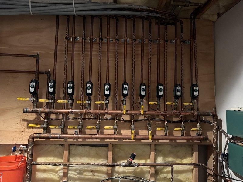 Successfully replaced two zone valve bodies in the multi-zone hydronic heating system, which required draining and refilling the system. Verified proper operation of all ten zone valves and confirmed the Navien boiler was functioning correctly after service completion.