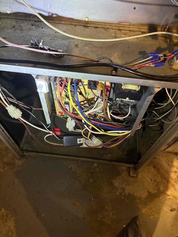 Performed diagnostic service on aging furnace not turning on. Inspected internal wiring and components, identifying dirty flame sensor as cause of no-heat condition. Cleaned flame sensor, restored proper flame detection, and verified system operation through complete heating cycle.