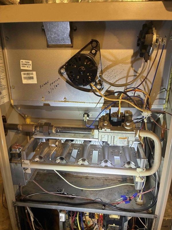 Performed diagnostic service on aging furnace not turning on. Inspected internal wiring and components, identifying dirty flame sensor as cause of no-heat condition. Cleaned flame sensor, restored proper flame detection, and verified system operation through complete heating cycle.
