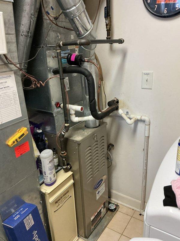 Performed scheduled maintenance service on Carrier furnace system, including cleaning and inspection. Replaced #201 media filter and #10 humidifier pad in the Aprilaire whole-home humidifier unit. System is now operating within normal parameters with proper humidity control.