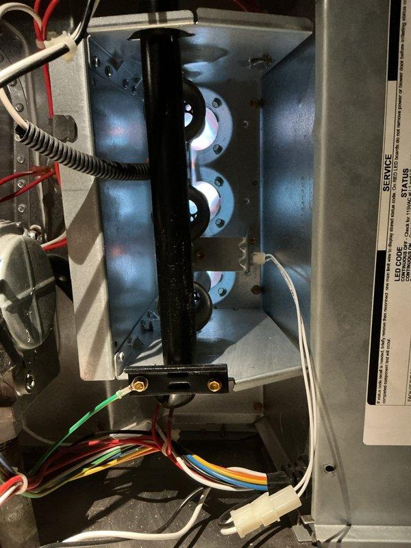 Performed scheduled maintenance on two gas furnaces and two humidifiers under existing service agreement. Inspected and replaced worn ignition electrode on primary unit. Examined heat exchanger for proper operation and verified all electrical connections were secure. Both systems now functioning within normal parameters.