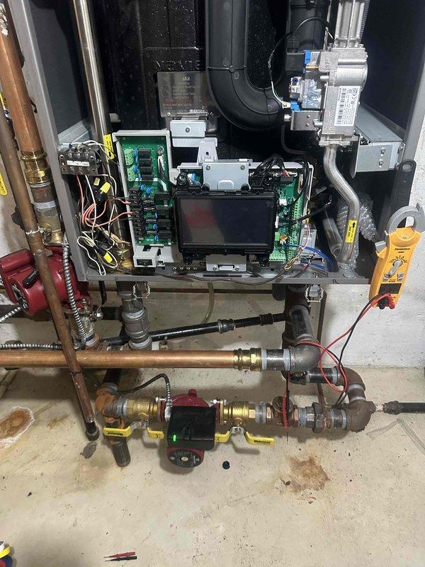 Responded to callback for boiler not functioning despite recent repairs. Diagnostic testing revealed faulty control board circuit with compromised connections. Replaced damaged wiring harness and recalibrated digital interface on hydronic system to restore proper operation of circulator pump and control functions.