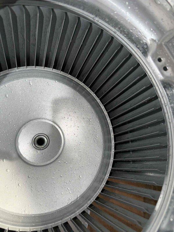 Performed routine maintenance under agreement on Infinity system with furnace and humidifier. Inspected blower wheel assembly and found condensation/moisture present. Checked condensate pump operation and drainage system, noting proper function of the collection tray and PVC drain lines.