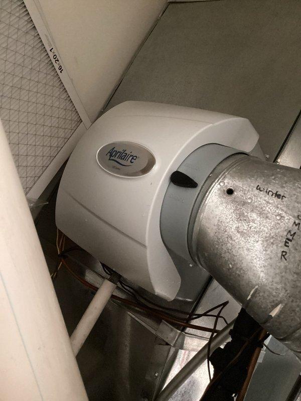Completed maintenance agreement service on furnace and Aprilaire humidifier, including filter replacement with #10 and 16x25x1 air filters. System functioning properly with thermostat set at 76°F and humidifier properly connected to ductwork with adequate water supply line.