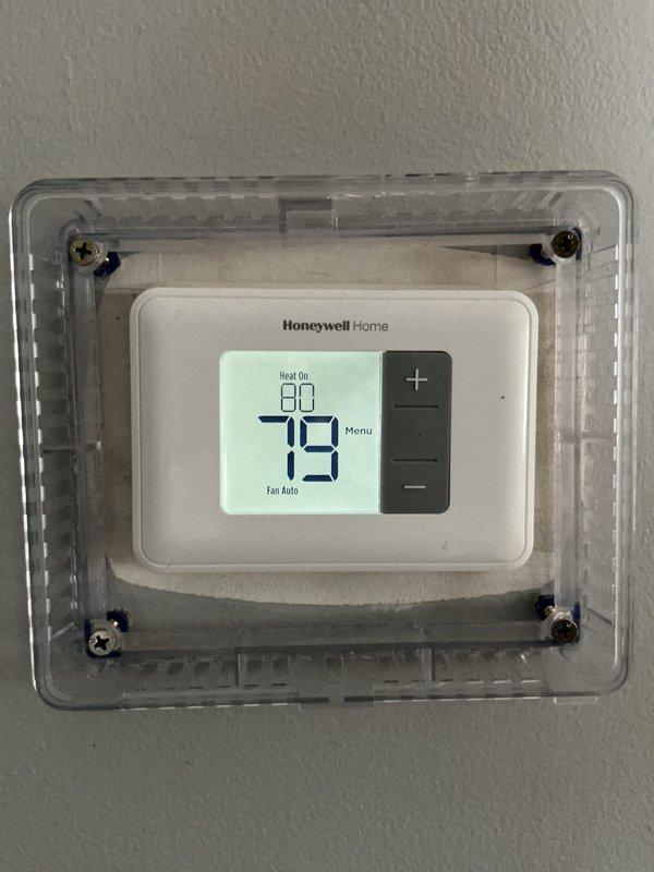 Performed routine maintenance on HVAC system per Agreement terms. Inspected Honeywell thermostat (set at 79°F with heat active) and examined furnace interior components including wiring connections, control board, and blower assembly. All systems operating within normal parameters.