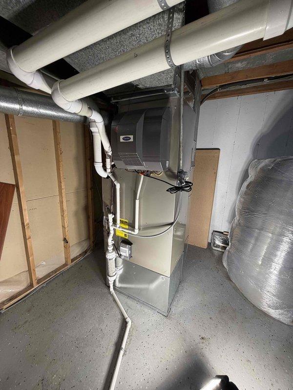 Successfully completed full HVAC system replacement, installing new furnace, condenser, coil, and humidifier. Relocated A/C wall bracket to the side of the house and properly connected all components with appropriate PVC venting, ductwork, and electrical connections per manufacturer specifications.