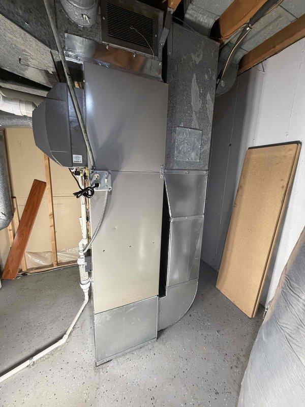 Successfully completed full HVAC system replacement, installing new furnace, condenser, coil, and humidifier. Relocated A/C wall bracket to the side of the house and properly connected all components with appropriate PVC venting, ductwork, and electrical connections per manufacturer specifications.