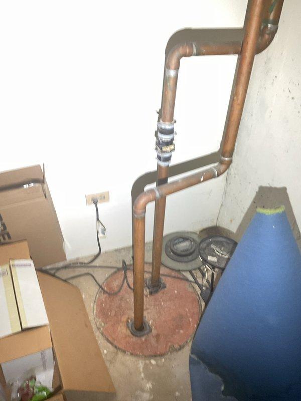Performed comprehensive plumbing inspection at residence, diagnosing two main issues: no hot water supply to upstairs shower and clogged upstairs bathroom sink. Inspection revealed corrosion at pipe connection points and examined water heater system with copper supply lines showing normal oxidation. Documented findings with photographic evidence for customer records.