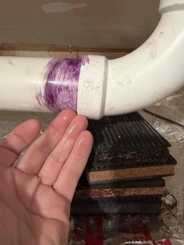 Responded to service call regarding previously repaired PVC condensate drain line that had developed a leak. Applied new PVC primer and cement to the compromised elbow joint connection, ensuring proper sealing. Inspected the entire condensate drain system and verified proper drainage function after repair.