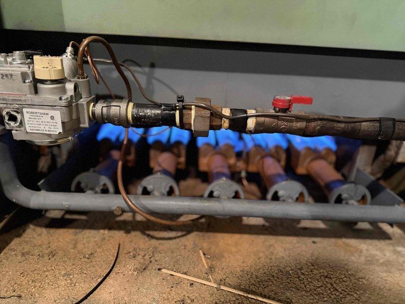 Returned to install thermocouple on gas valve assembly as part of callback service. Successfully completed installation and verified proper flame operation at all burners, confirming system functionality.