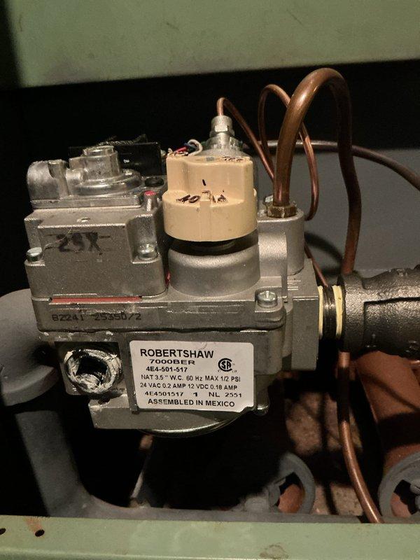 Responded to a non-functional boiler following previous thermocouple repair. Inspected the Robertshaw gas valve assembly and electrical components, including the dedicated boiler on/off switch and associated wiring. Restored proper operation by correcting the connection between thermocouple and gas valve.
