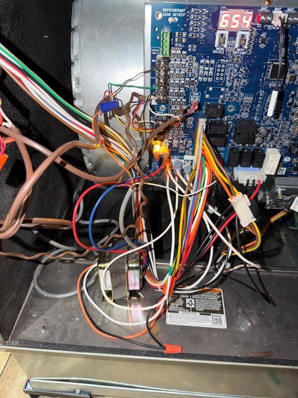 Completed installation of new furnace system with electronic control board featuring refrigerant leak detection functionality. Installed and connected 28VA transformer to power the unit, ensuring proper wiring of all control circuits with appropriate wire gauge and color-coding. System was tested and verified operational with all safety features functioning correctly.