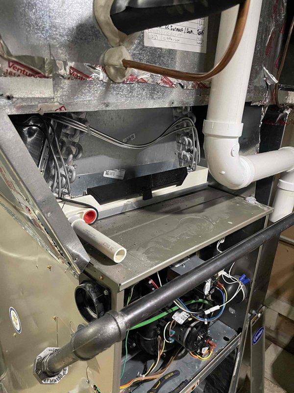 Successfully completed full HVAC system replacement including installation of new furnace unit with PVC venting system, thermostat, humidifier, and condensate pump. System was properly mounted, electrically connected, and tested to ensure optimal performance and compliance with manufacturer specifications.
