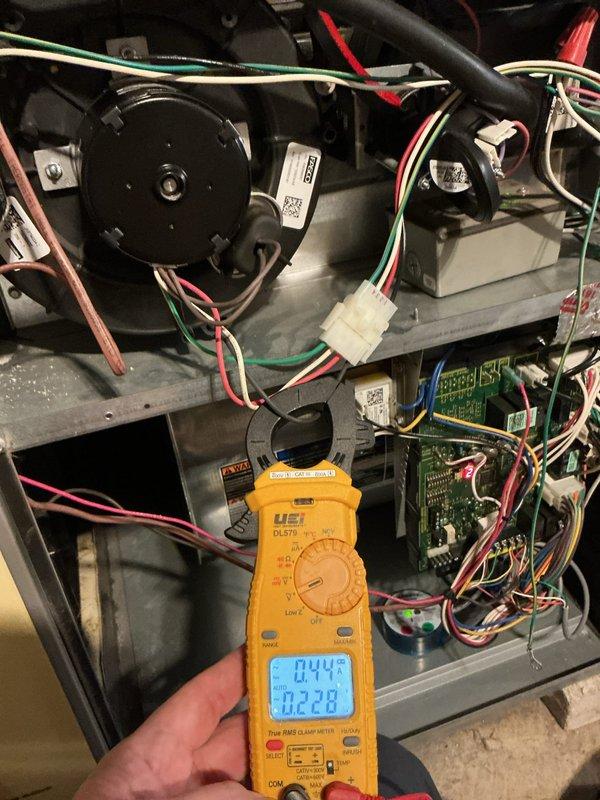 Diagnosed multiple error codes (E227, A475, E229, E271) on thermostat causing temperature drop to 62°F. System was cycled off and on, which resolved heating functionality. Performed electrical testing with UEI DL479 clamp meter showing readings of 0.44 and 0.22 on control wiring.