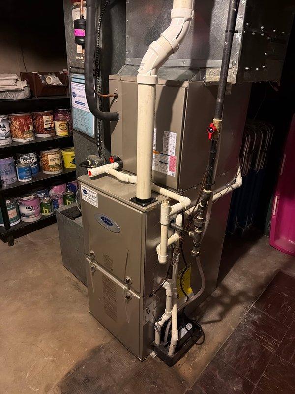 Responded to no-heat call for Carrier furnace system blowing cool air. Conducted system inspection, identified clogged air filter restricting proper airflow. Replaced filter, cleaned components, and verified proper ignition sequence and heat output restoration. System now functioning within manufacturer specifications.