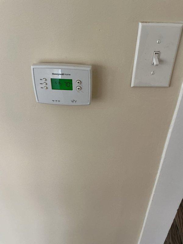 Conducted diagnostic inspection on leaking boiler system, identifying excessive dripping from water pressure release valve causing water accumulation in basement. Examined dual boiler units (circa 2019), associated plumbing network, and thermostat system functioning, documenting conditions with photographic evidence prior to scheduled bank appraisal.