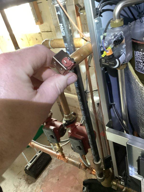 Returned to job site to replace sensors under warranty through NTI. Identified and disconnected faulty components from copper pipe fittings in the HVAC system. Parts have been ordered and are being held at shop for installation upon arrival.
