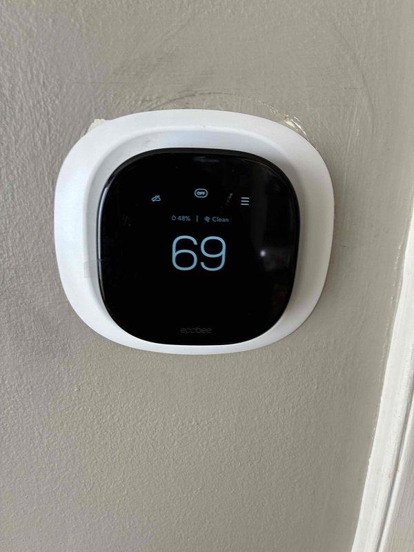 Successfully installed two Ecobee smart thermostats as part of warranty service, with both units confirmed operational and displaying proper temperature readings. Additionally, installed complimentary wet switches at both the upstairs and downstairs furnace units to provide overflow protection.