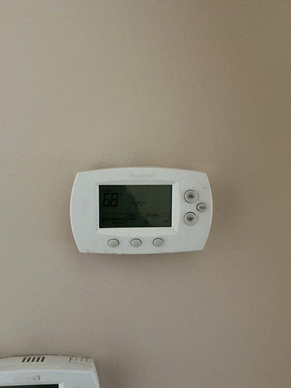Performed scheduled maintenance on furnace and boiler per service agreement. Inspected Honeywell thermostat system showing proper operation with temperature reading at 68°F. Verified heating and cooling functions working correctly with appropriate temperature differential settings.