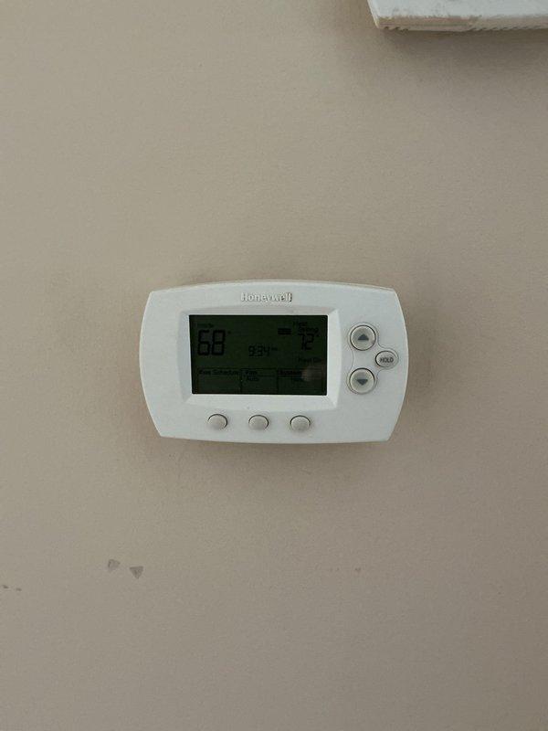 Performed scheduled maintenance on furnace and boiler per service agreement. Inspected Honeywell thermostat system showing proper operation with temperature reading at 68°F. Verified heating and cooling functions working correctly with appropriate temperature differential settings.