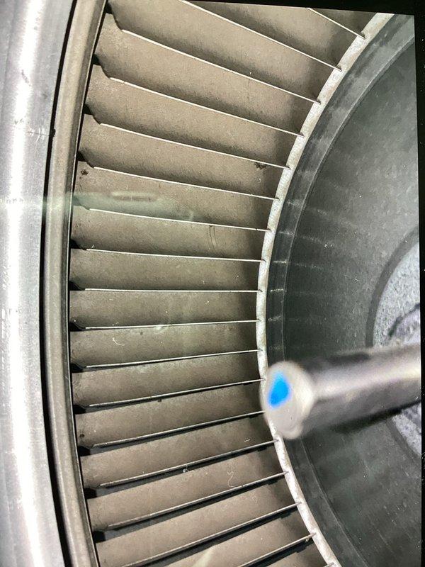 # Service Report: No Heat Call - Carrier Furnace

Responded to a no-heat service call on a Carrier furnace system over 10 years old. Customer requested a second opinion following a previous diagnosis from another contractor.

Upon arrival, performed complete system diagnostic to identify cause of no-heat condition. Conducted visual inspection of all major components including heat exchanger, blower assembly, and control board. Accessed blower compartment and inspected squirrel cage blower wheel, noting significant dust and debris accumulation on blades and assembly. Heavy contamination on blower wheel reduces airflow efficiency and can trigger safety limit switches, preventing proper heating operation.

Examined electronic control board and associated wiring connections. Control board showed normal wear consistent with age of unit. Inspected all wire terminations including thermostat connections (white, red, blue, yellow, brown) for proper seating and continuity. Verified control board