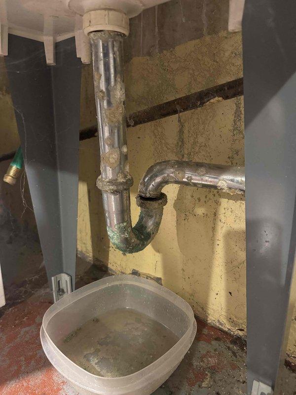 Completed water heater replacement in residential utility area. Removed existing tanked water heater unit and installed new replacement model with proper copper supply line connections and brass shut-off valves. Verified all plumbing connections for proper seal integrity, ensured adequate clearances per manufacturer specifications, and tested unit operation upon completion. New installation includes properly configured hot and cold water supply lines with appropriate valve access for future maintenance requirements.