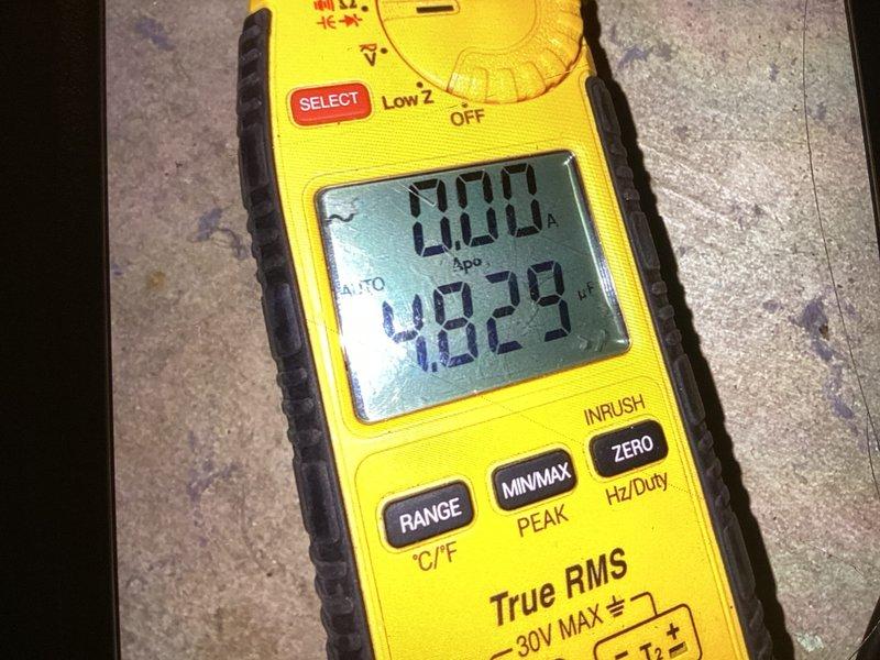 Completed comprehensive cooling and heating maintenance agreement service on gas furnace and air conditioning system. Performed thorough inspection of furnace interior components including blower motor, pressure switch assembly with gauge, gas connections, and electrical wiring. Verified all wire connections secure and tested system electrical parameters using digital multimeter, measuring voltage at 20.00 VAC to ensure proper operation and system safety.