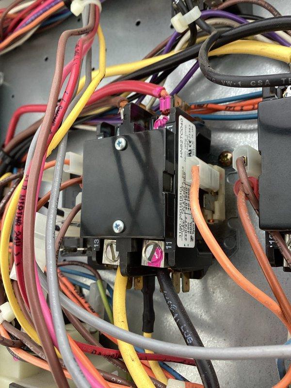 Responded to callback for commercial RTU with indoor fan running continuously overnight following thermostat and main board replacement. Upon arrival, inspected electrical components including contactor assembly and control wiring to diagnose continuous fan operation and reported burning smell. Performed thorough visual inspection of rooftop unit, reviewed recent equipment modifications, and documented electrical connections and internal components to identify root cause of persistent operational issue.