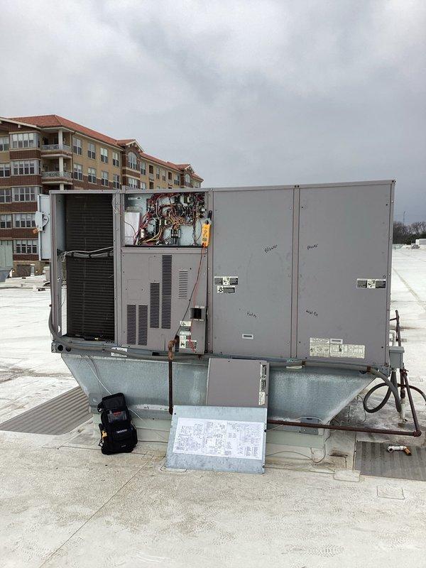 Responded to callback for commercial RTU with indoor fan running continuously overnight following thermostat and main board replacement. Upon arrival, inspected electrical components including contactor assembly and control wiring to diagnose continuous fan operation and reported burning smell. Performed thorough visual inspection of rooftop unit, reviewed recent equipment modifications, and documented electrical connections and internal components to identify root cause of persistent operational issue.