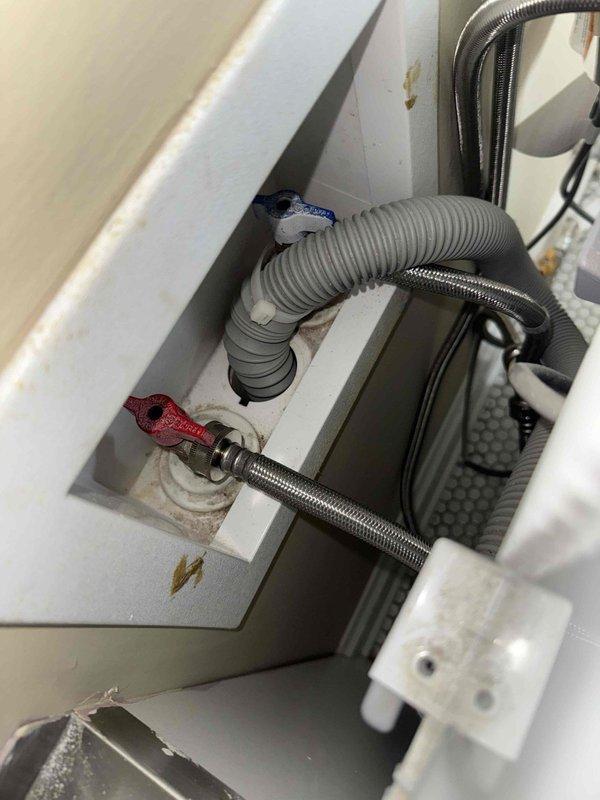 Installed a whole home water filtration system and Moen whole home water shut-off monitoring system in the basement utility area. The installation included integration with existing copper supply lines, proper valve placement with shut-off controls, and connection of the monitoring system components. All plumbing connections were secured with appropriate fittings, and the system was tested to ensure proper operation and leak-free performance.