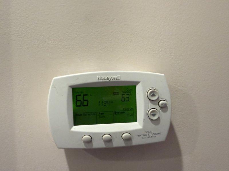 Performed comprehensive maintenance on air conditioning system and air handler as part of agreement service. Conducted complete system inspection including thermostat functionality verification, ductwork assessment in attic space, and equipment operational checks. System currently operating at setpoint with thermostat displaying proper temperature readings. Noted previous recommendation for refrigerant evaluation from last service visit; will continue monitoring system performance. All accessible components inspected and found to be functioning within normal parameters at time of service.