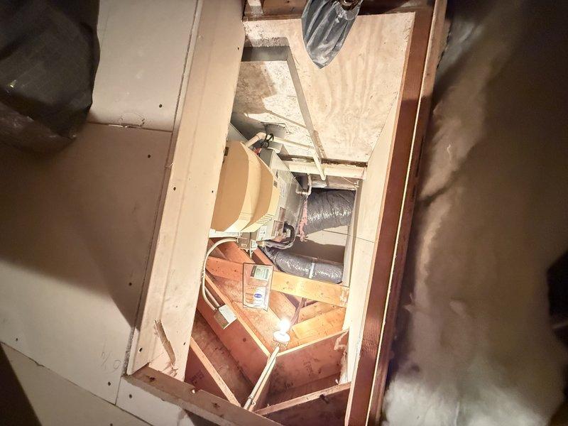 Performed comprehensive maintenance on air conditioning system and air handler as part of agreement service. Conducted complete system inspection including thermostat functionality verification, ductwork assessment in attic space, and equipment operational checks. System currently operating at setpoint with thermostat displaying proper temperature readings. Noted previous recommendation for refrigerant evaluation from last service visit; will continue monitoring system performance. All accessible components inspected and found to be functioning within normal parameters at time of service.