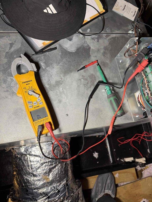 Responded to service call for recurring fuse failure on recently installed Unico air handler. Performed comprehensive electrical diagnostics using clamp meter and multimeter to isolate the fault. Testing confirmed short circuit in existing low voltage control wiring between thermostat and air handler. Original installation utilized existing low voltage wire, which was determined to be damaged and causing intermittent short to ground. Ran new 18/8 thermostat wire from air handler location to thermostat, replacing compromised conductor. Secured and properly supported new wire run per manufacturer specifications. Tested all control circuits for proper voltage and continuity. Verified system operation through complete heating and cooling cycles with no fuse failures. Unit now operating within normal parameters.