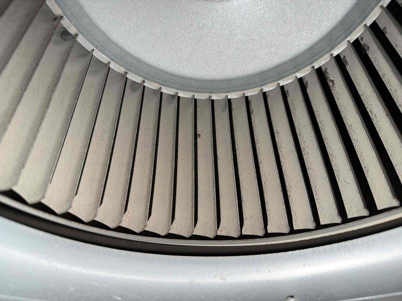 Performed comprehensive furnace inspection and cleaning for new homeowner. Accessed interior components, inspected blower wheel assembly which showed moderate dust accumulation on blades, examined drainage system and PVC condensate lines, and verified all electrical connections and safety controls were functioning properly. Discussed preventive maintenance membership program options with customer to ensure ongoing system reliability.