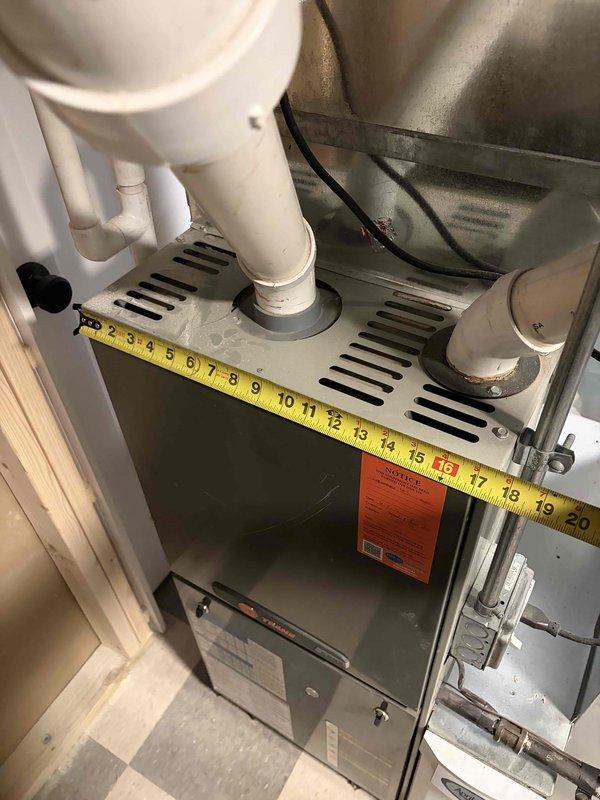 Completed furnace replacement for 20-year-old unit with cracked heat exchanger that was shut down for safety. New system installed in easily accessible utility space with proper clearances, condensate drainage lines, and electrical connections verified. Previous repair credit applied to replacement installation.